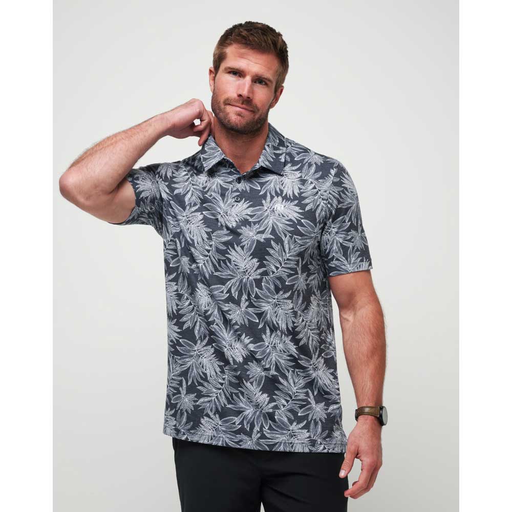 Man wearing a Travis Mathew Sea Journey Men's Polo Shirt