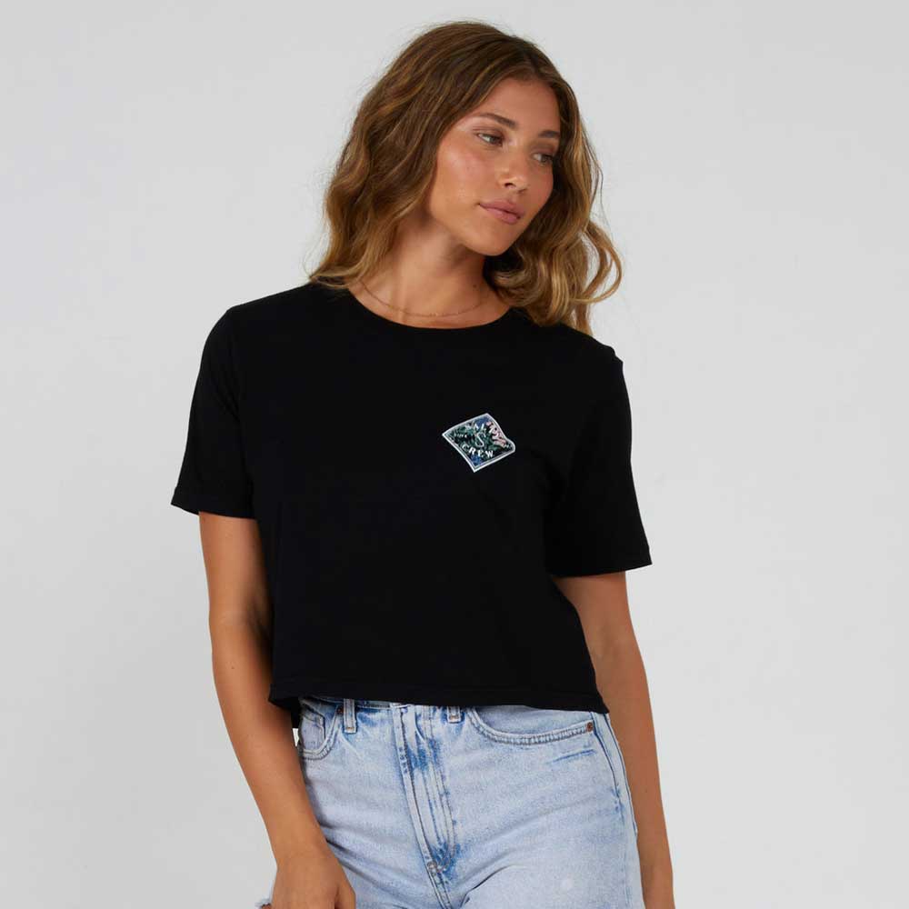 Girl wearing the Salty Crew Women's Tippet Fill Crop T-Shirt Short Sleeve in Black