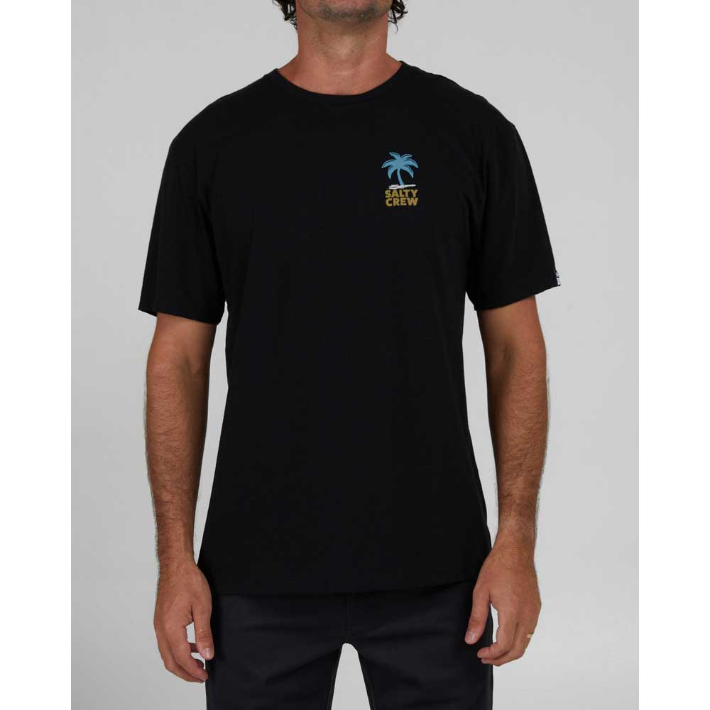 Man wearing a Salty Crew Tropics Premium Short Sleeve T-Shirt - Black