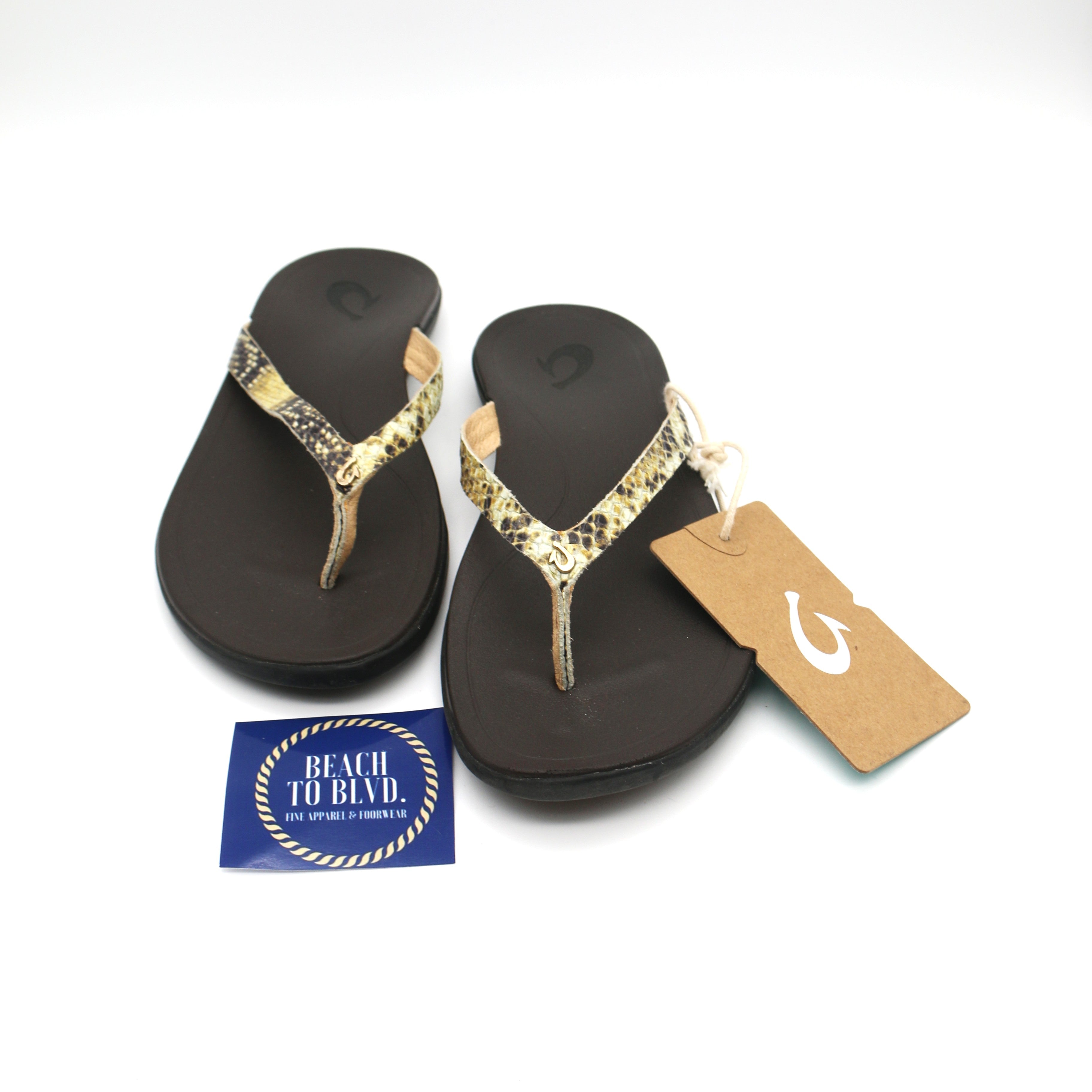 Olukai Ho'opio Leather Women's Beach Sandals - Tan/Mo'o - Gold - BeachToBlvd