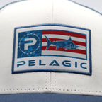 Pelagic The Pursuit Trucker Hat - Icon Americamo